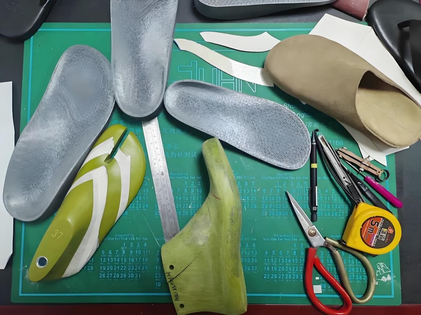 VELA material development, leather selection, and private label sampling table